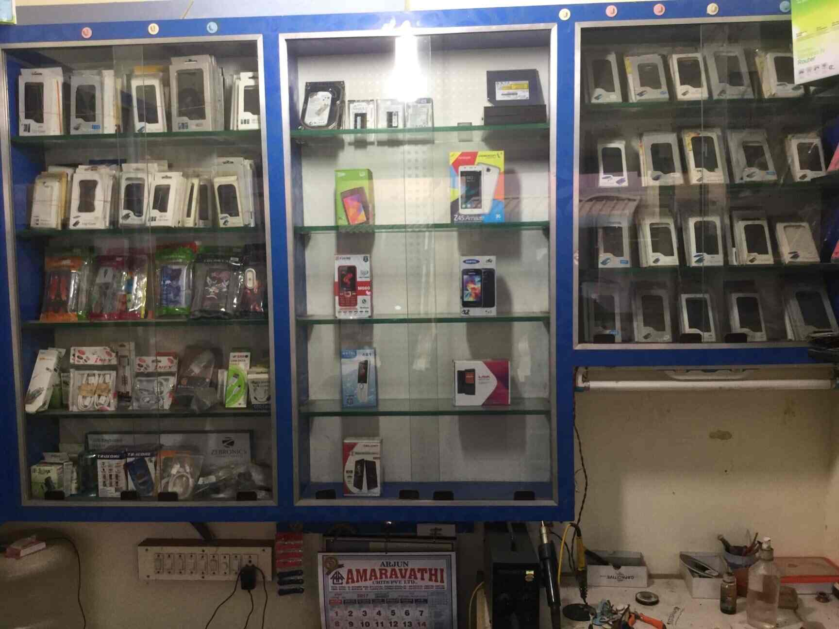 Smart Computers And Mobiles in Pallavaram,Chennai Best LGMobile Phone Repair & Services in