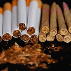 heater cigarette Smoke And Steam Systems In Comparison, Normal Cigarette, Tobacco Heater  With Sticks And E-cigarette With Liquid On A Brown Table, Copy Space,  Selected Focus Stock Photo, Picture and Royalty Free Image. Image
