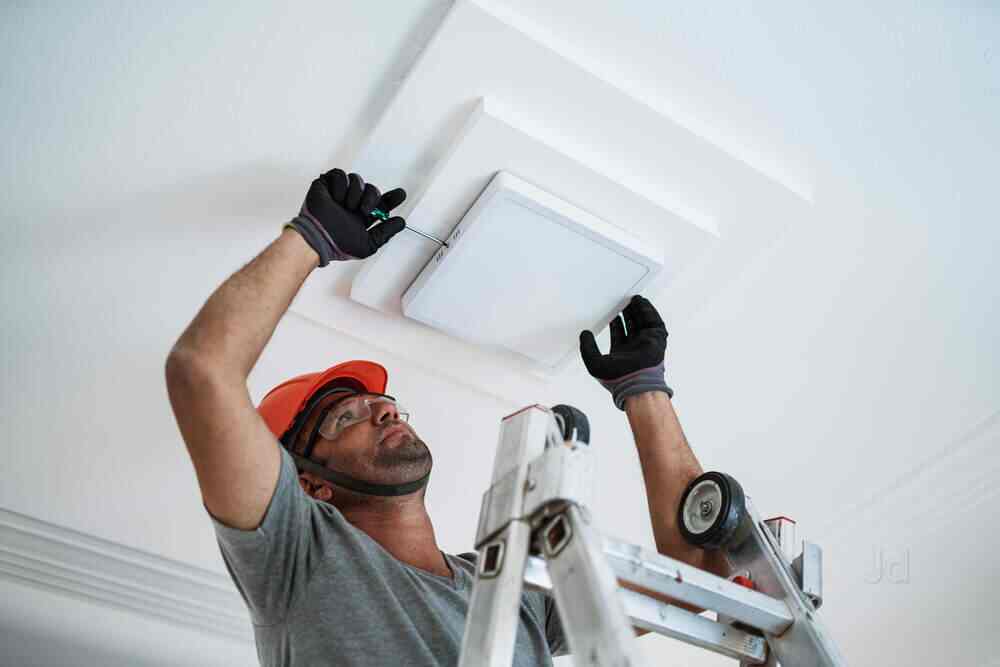 Fitter installing LED lighting circuit in Hextable