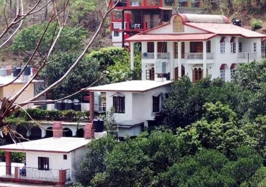 New Bhandari Swiss Cottage Photos Gangotri Pictures Images