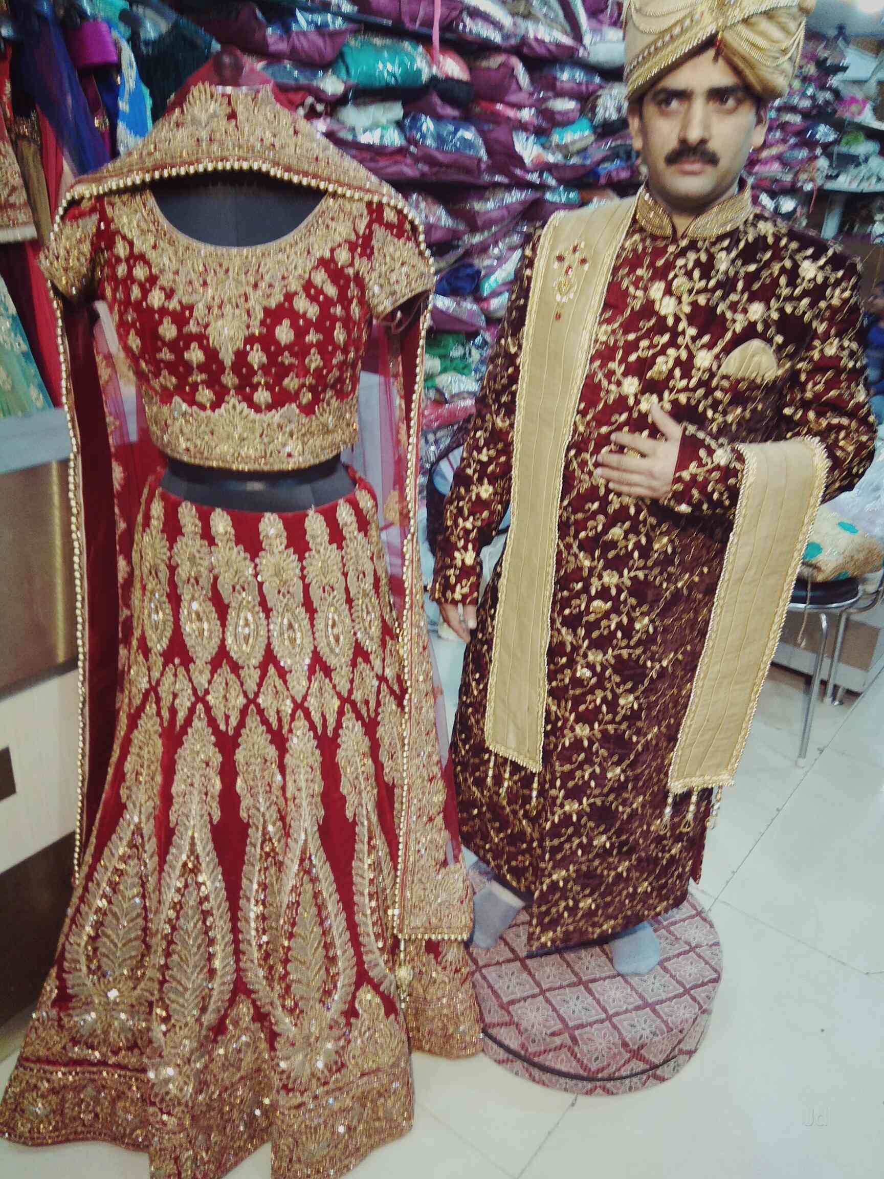 bride and groom designer wear