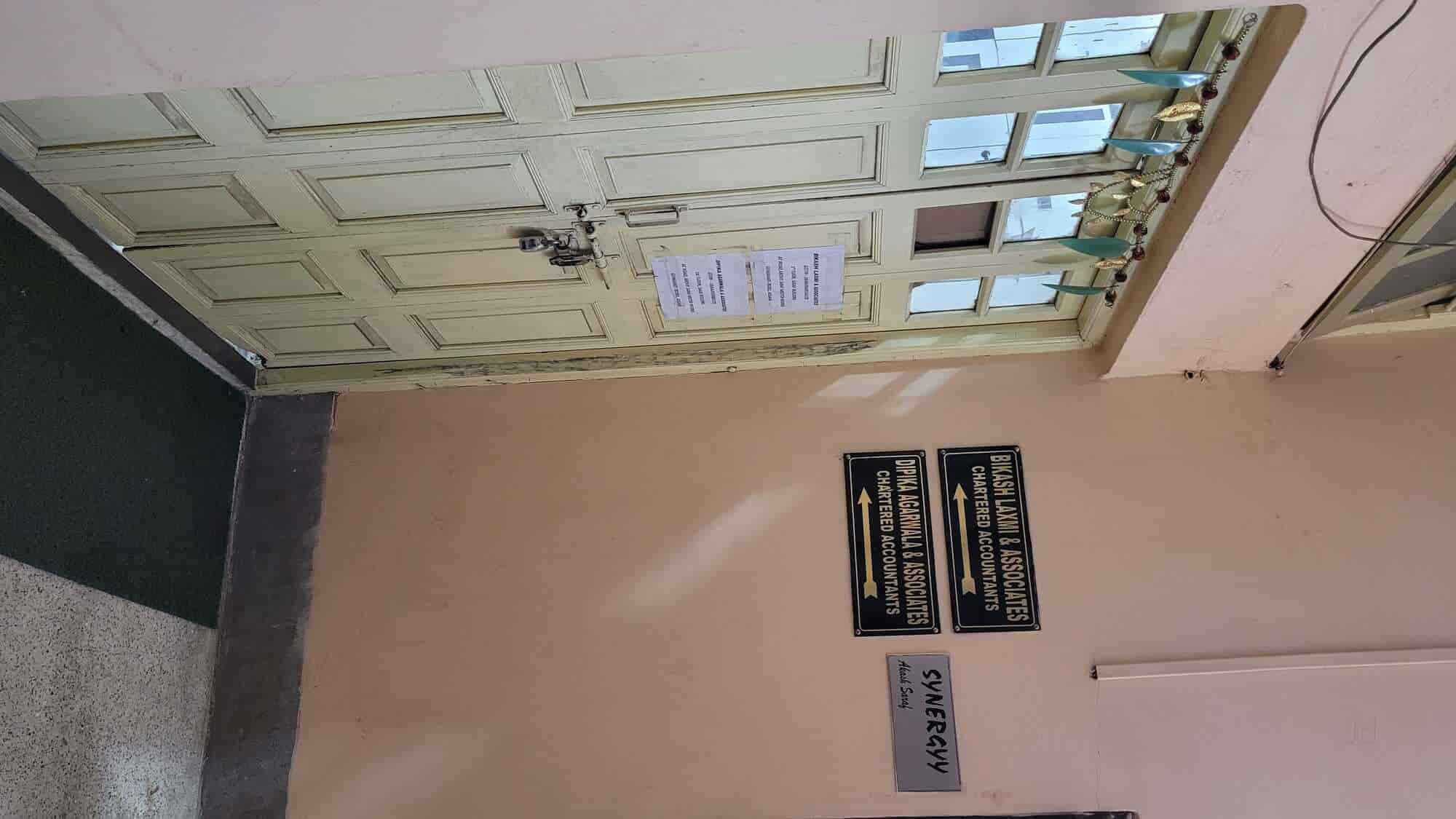 Bikash Laxmi & Associates in Opposite Axis Bank Saraf Building Old