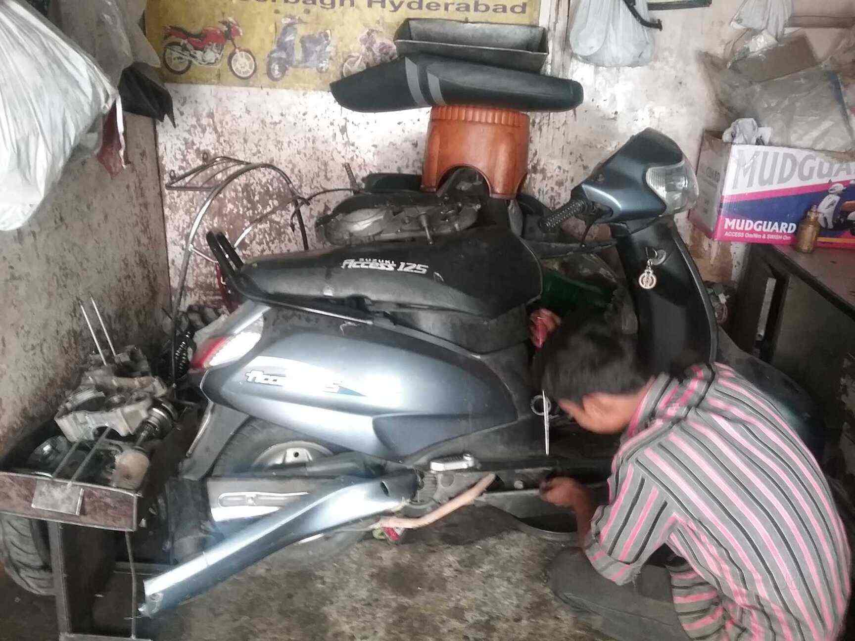 Scooty repairing best sale