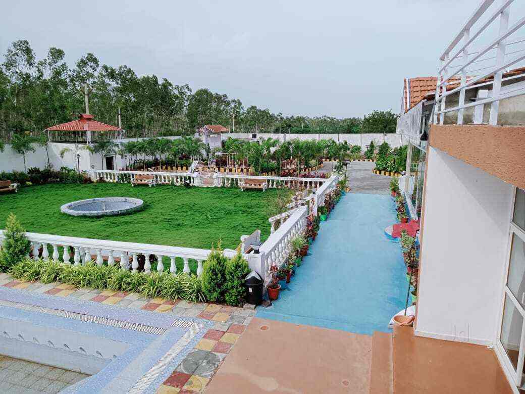 Book White Farmhouse in Moinabad,Hyderabad Best Farm House On Rent in