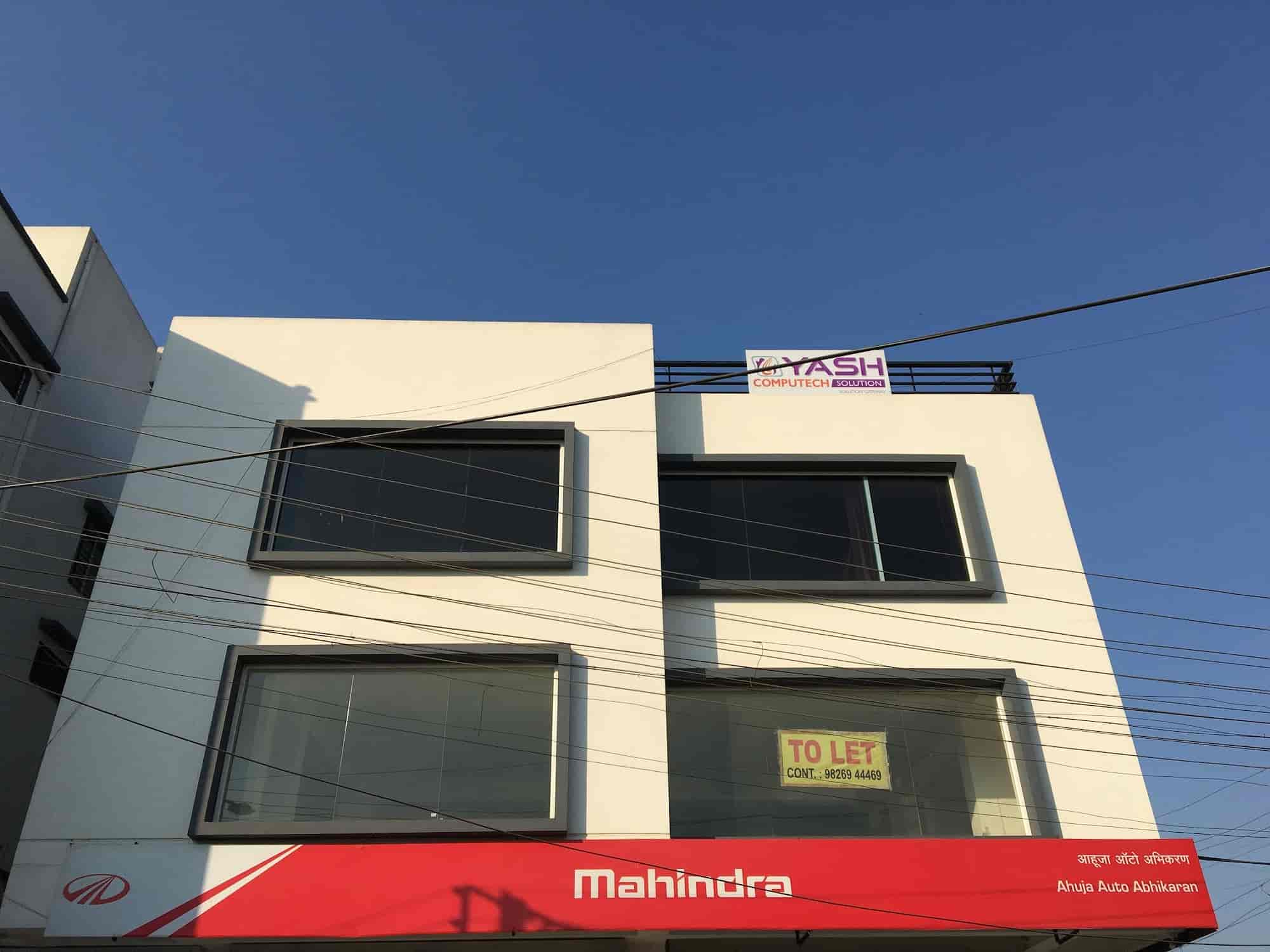 A modern office building facade representing the MPSEDC IT Park or Crystal IT Park in Indore