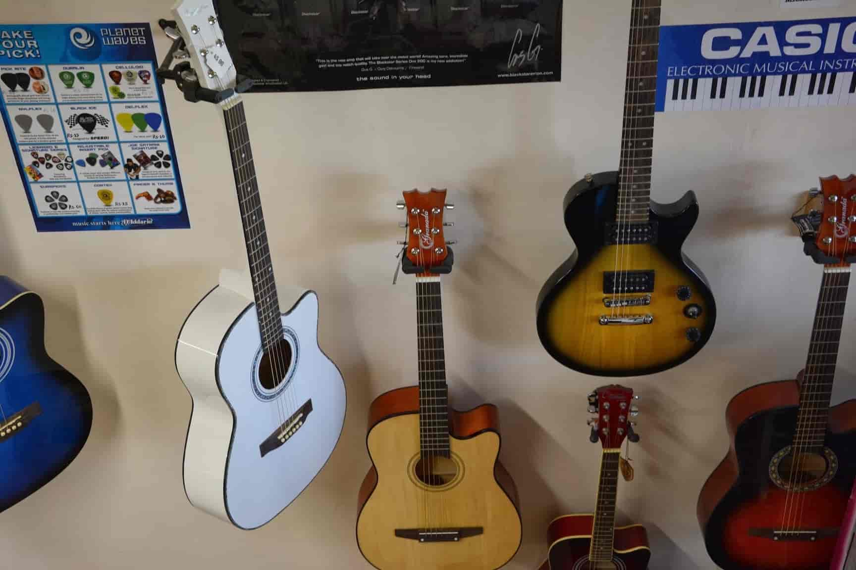 Top Guitar Dealers in Kalyan West Best Guitar Shops Justdia