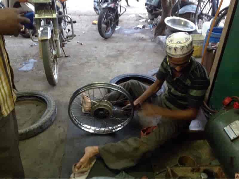 Two wheeler wheel balancing near me sales