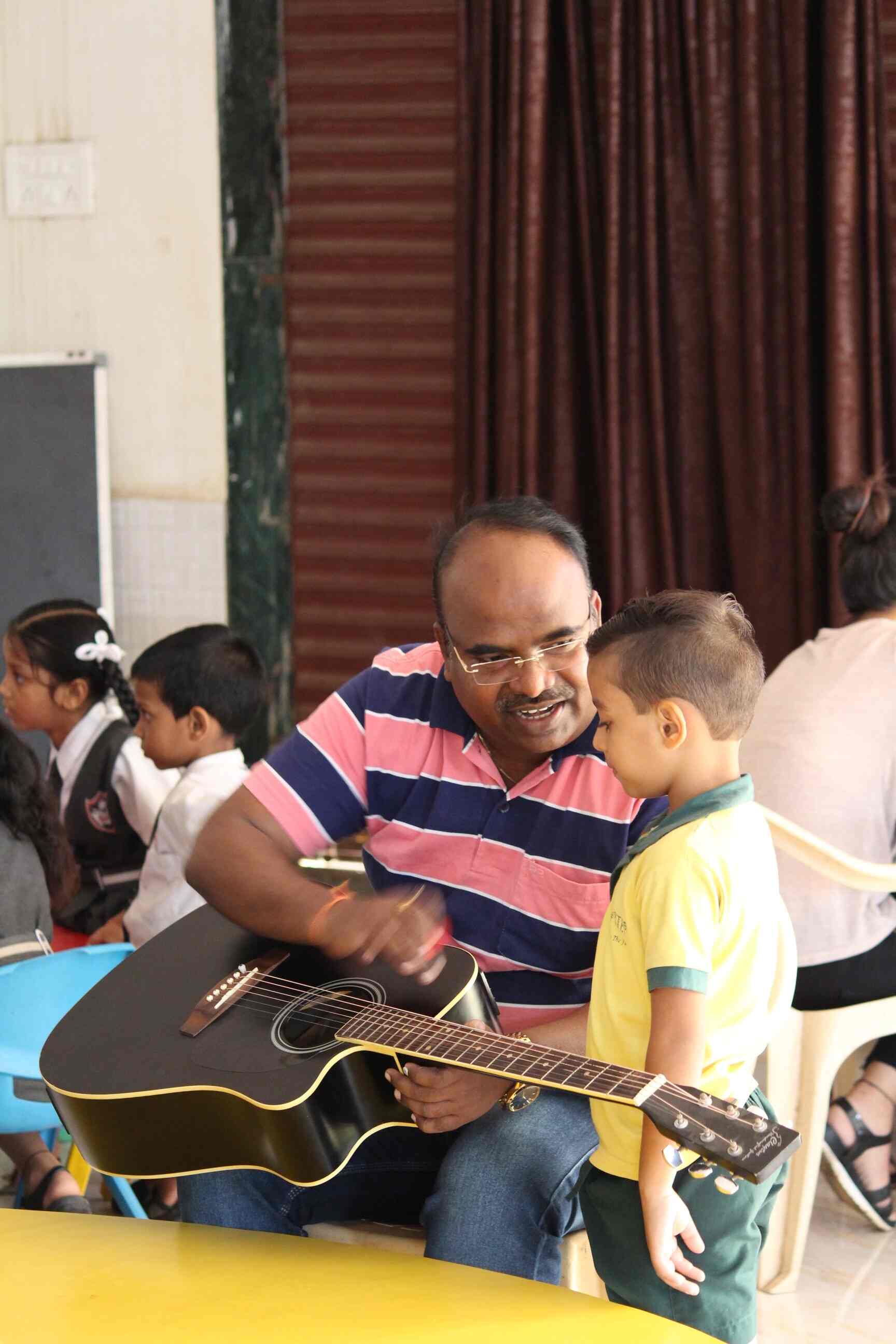 Divine Guitar Classes in Nalasopara East,Mumbai Best Music Classes