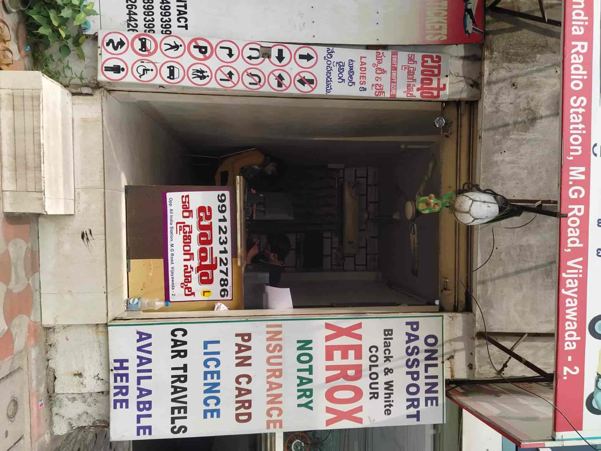 Basha Car Driving School Travels & Communications in Mg Road,Vijayawada