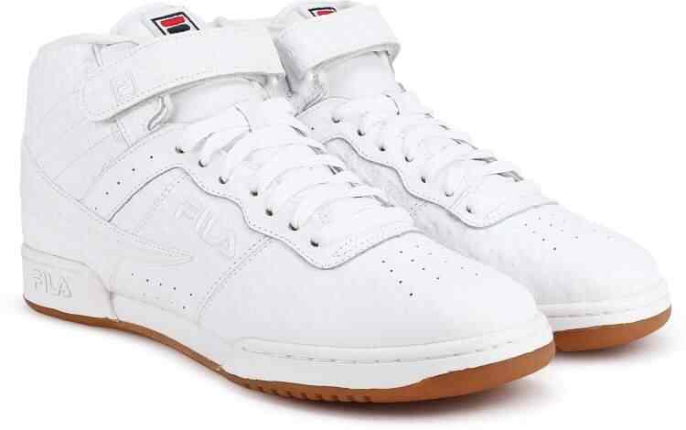 white patent fila trainers