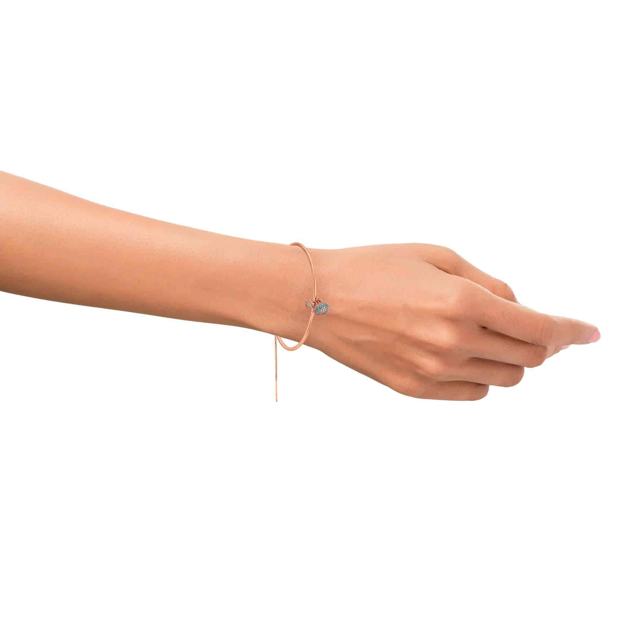 Mia by Tanishq by Tanishq 14KT Rose Gold Bangle with Cubic Zirconia Studded Charms 47 x 57 mm