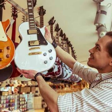 Pluto bass guitar on sale
