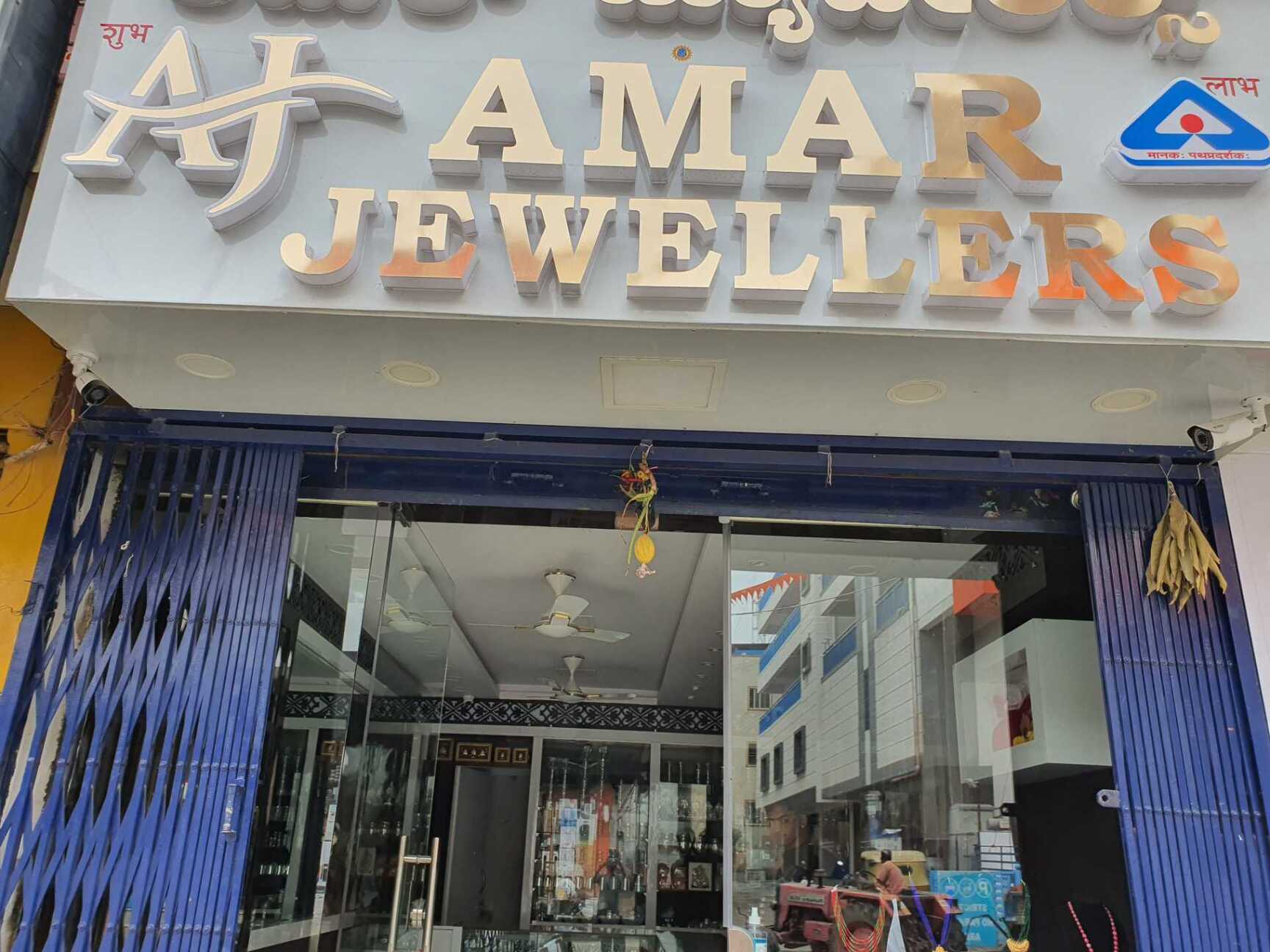 https://content.jdmagicbox.com/v2/comp/bangalore/m2/080pxxxx.xxxx.100828001344.a4m2/catalogue/amar-jewellers-and-bankers-kaggadasapura-road-bangalore-jewellery-showrooms-o8jdhhu7p7.jpg