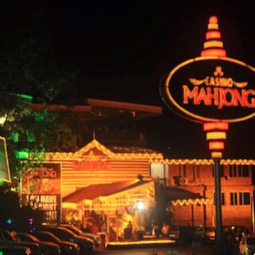 Casino interior showcasing gaming tables and slots