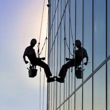 Professional glass cleaning in progress