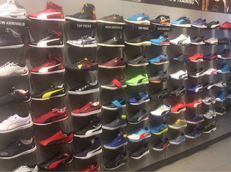 puma sports shoes store near me